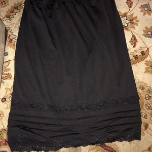 Cute black knee length skirt  lace hem. Can be casual or dressed up. L